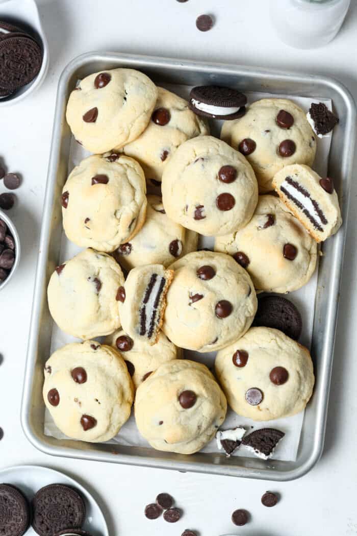 Oreo stuffed cookies on pan with milk