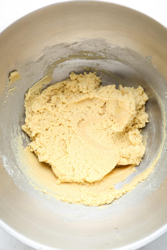 Light colored dough in big bowl