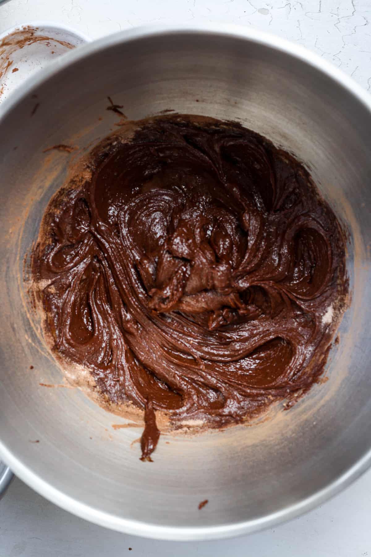 Thick gluten free brownie batter in bowl