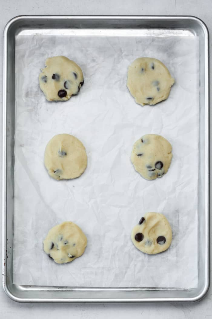 Flattened cookie dough on pan
