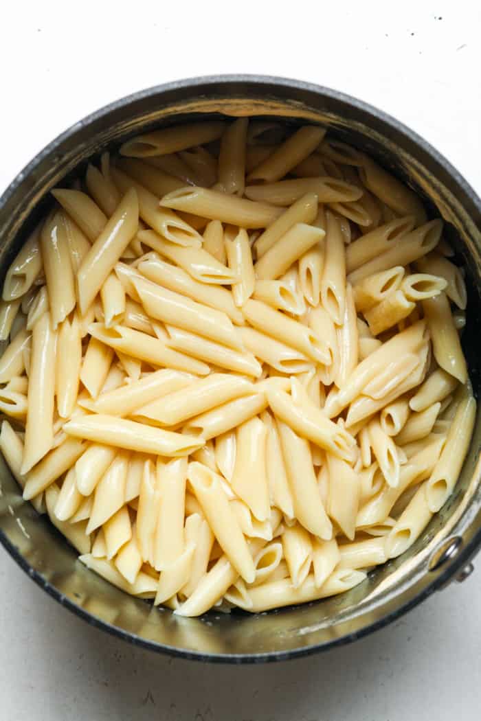 Cooked penne pasta in pot
