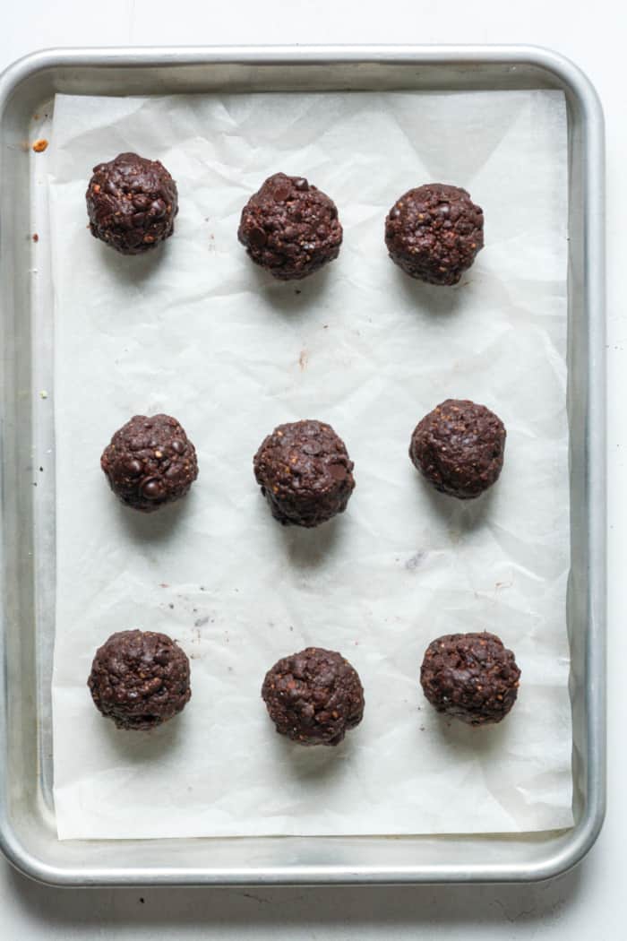 Chocolate bliss balls on pan