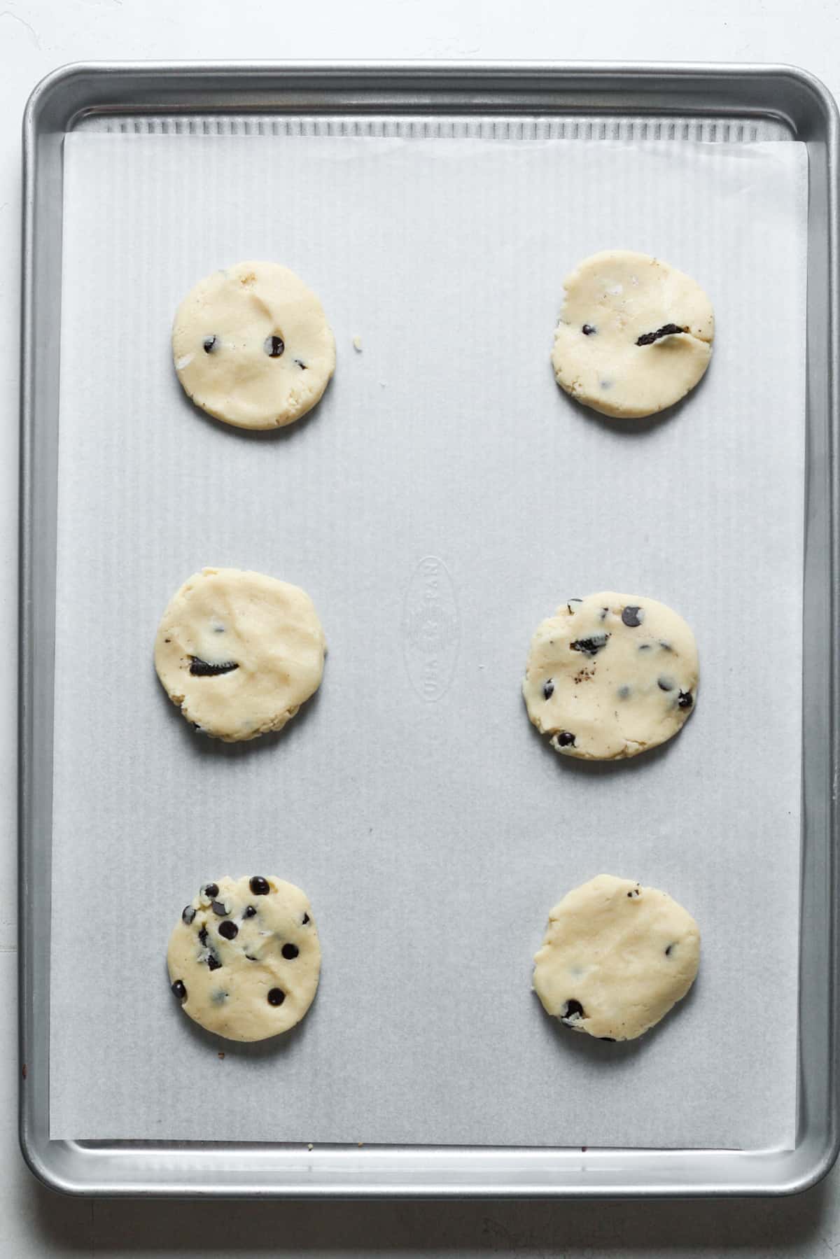 Flat cookie dough on pan
