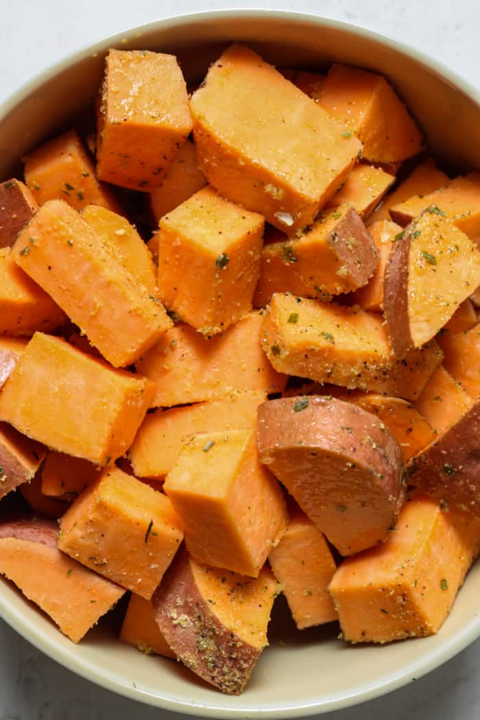 Diced sweet potatoes in bowl.