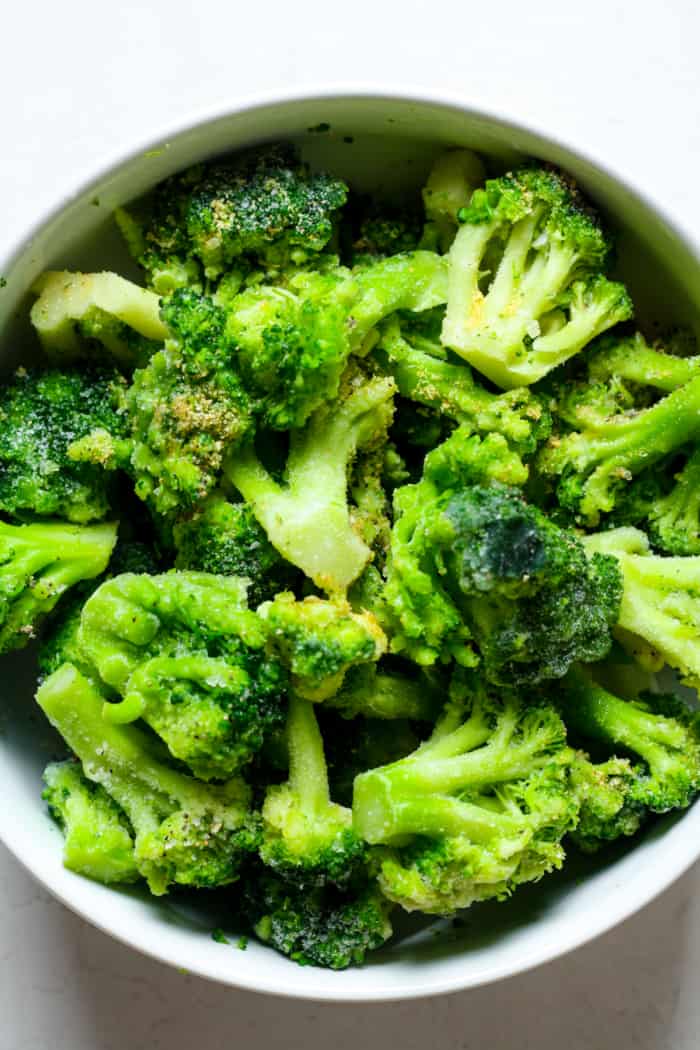 Frozen broccoli in bowl.