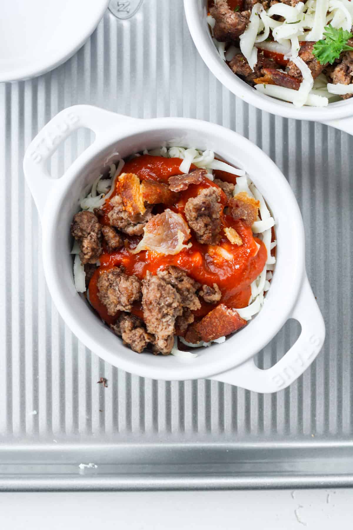 Bowl with beef and bacon.