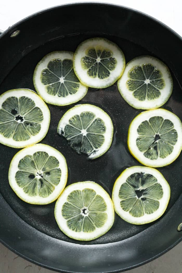 Lemon slices in skillet.