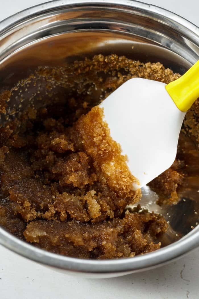 Melted butter with brown sugar in bowl.