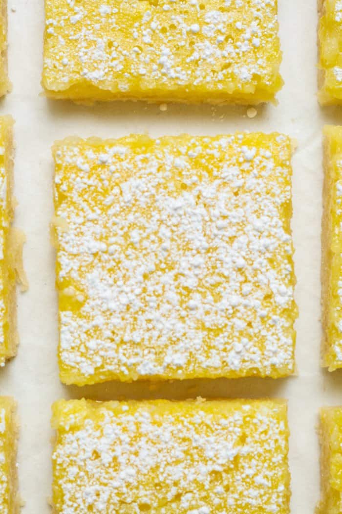 Lemon squares with powdered sugar.