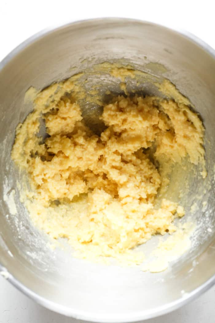 Yellow cookie dough in bowl.