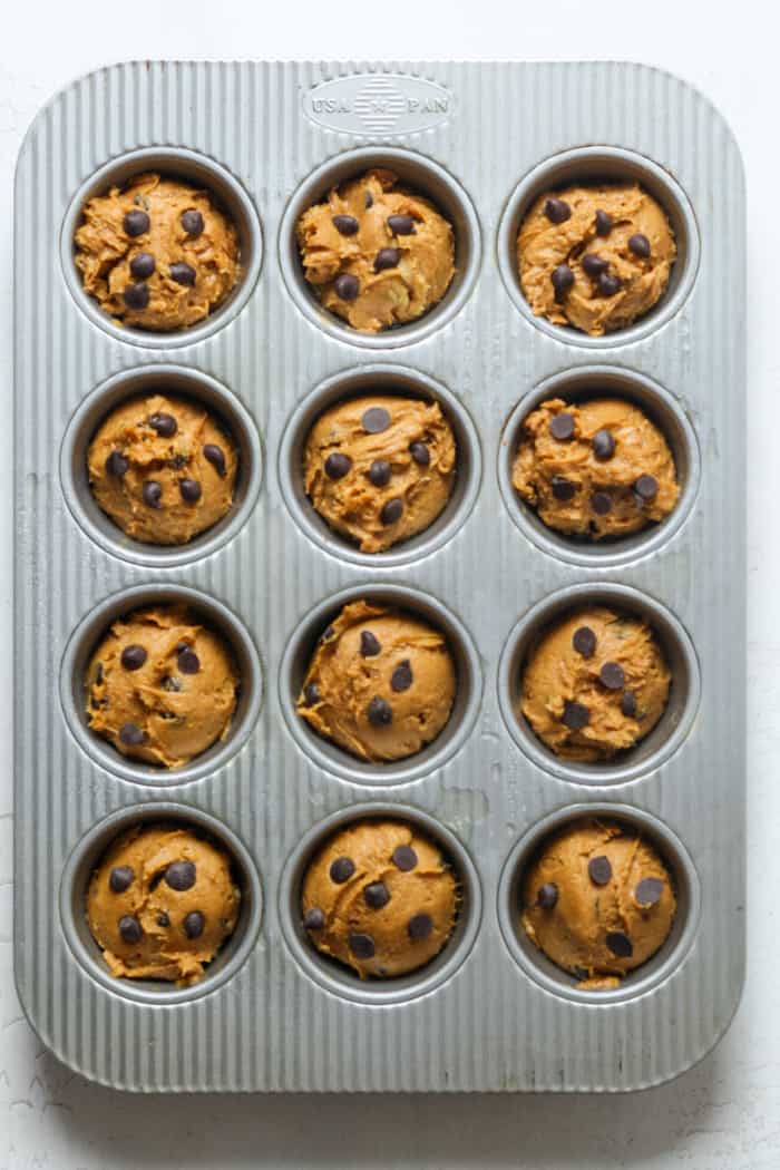 Pumpkin muffins in pan.