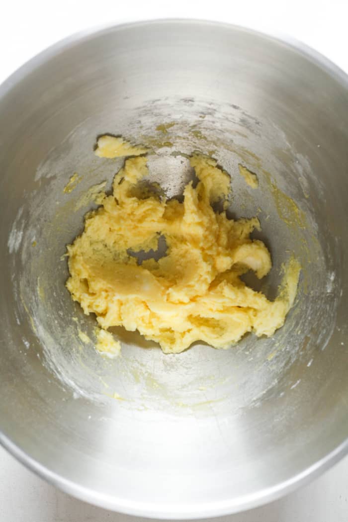 Yellow dough in bowl.