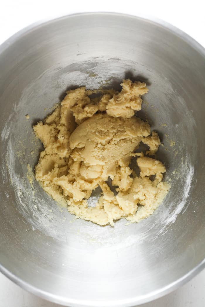 Sugar cookie dough in bowl.