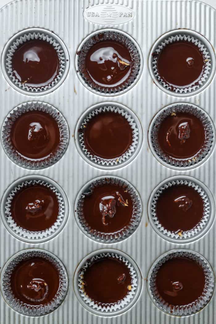 Melted chocolate in muffin pan.
