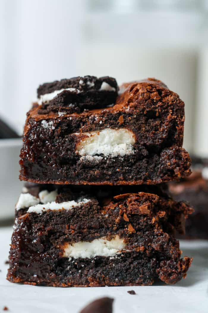 Two brownies with Oreo cookies.