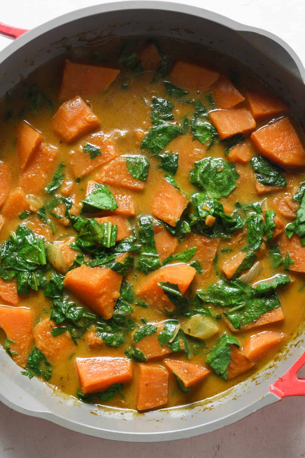 Sweet potato curry in skillet.