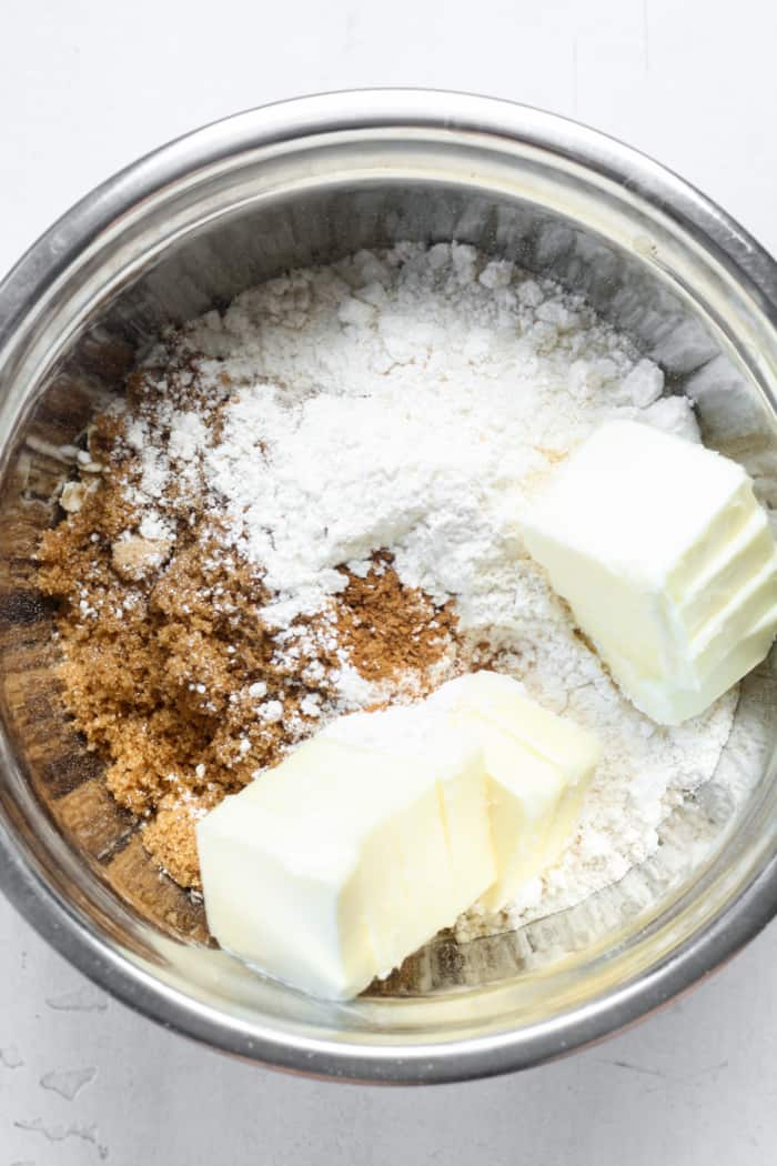 Butter and dry ingredients in bowl.