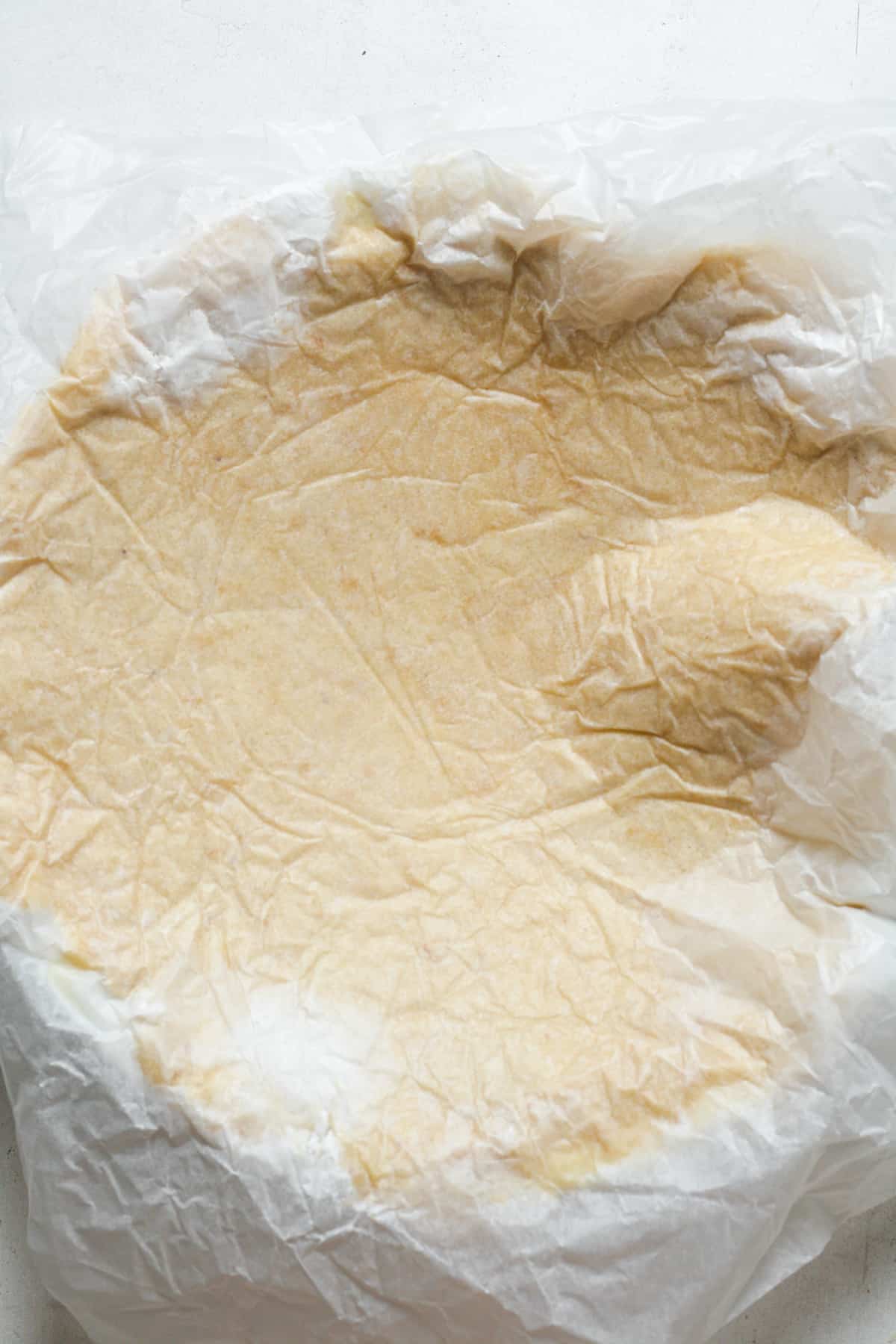 Pie crust with parchment paper.
