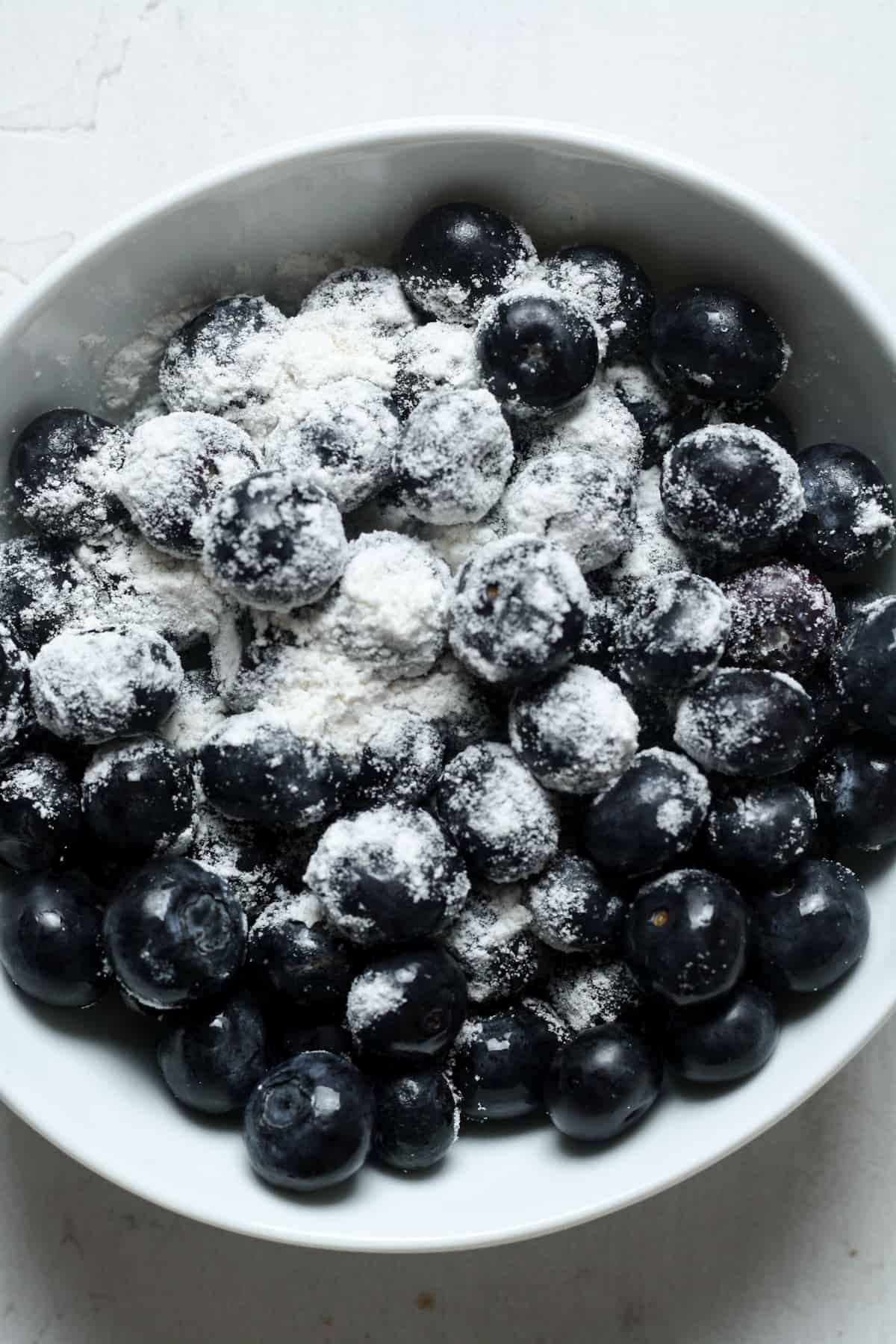 Flour covered blueberries.