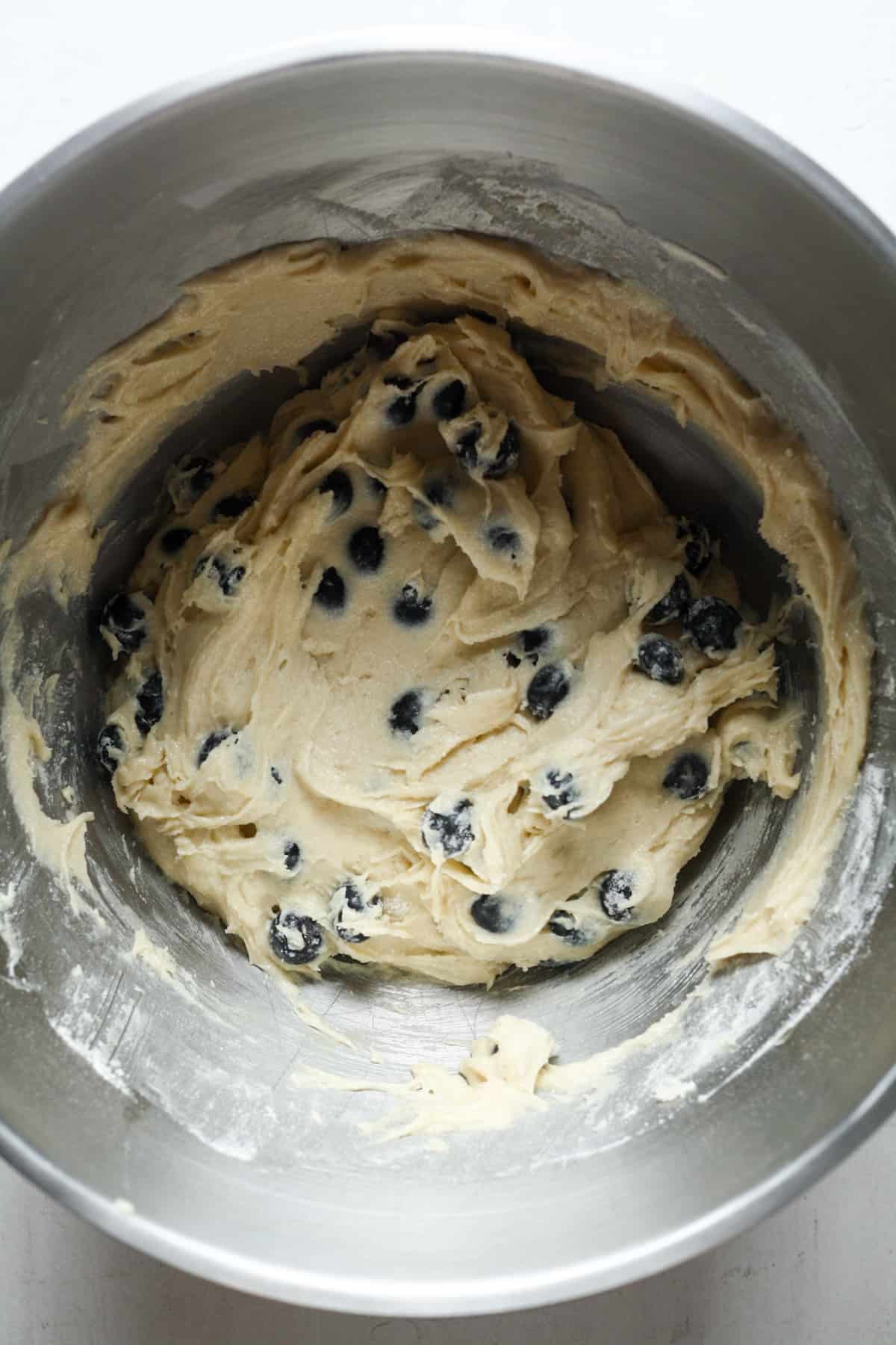 Blueberry muffin batter in bowl.