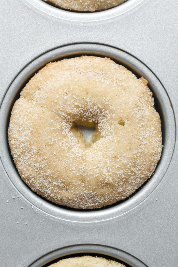 Baked vegan donuts in pan.
