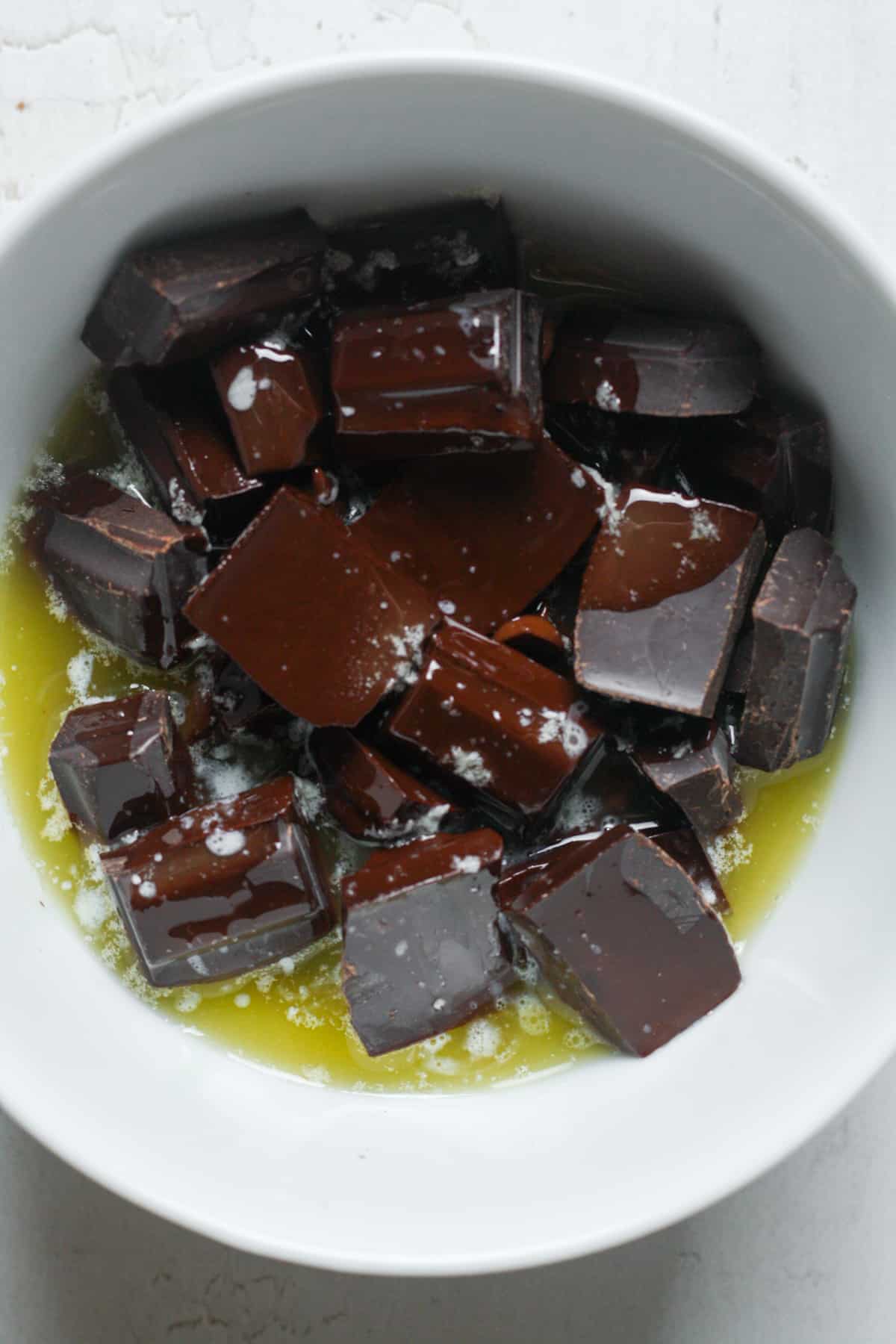 Melted butter and chocolate in bowl.
