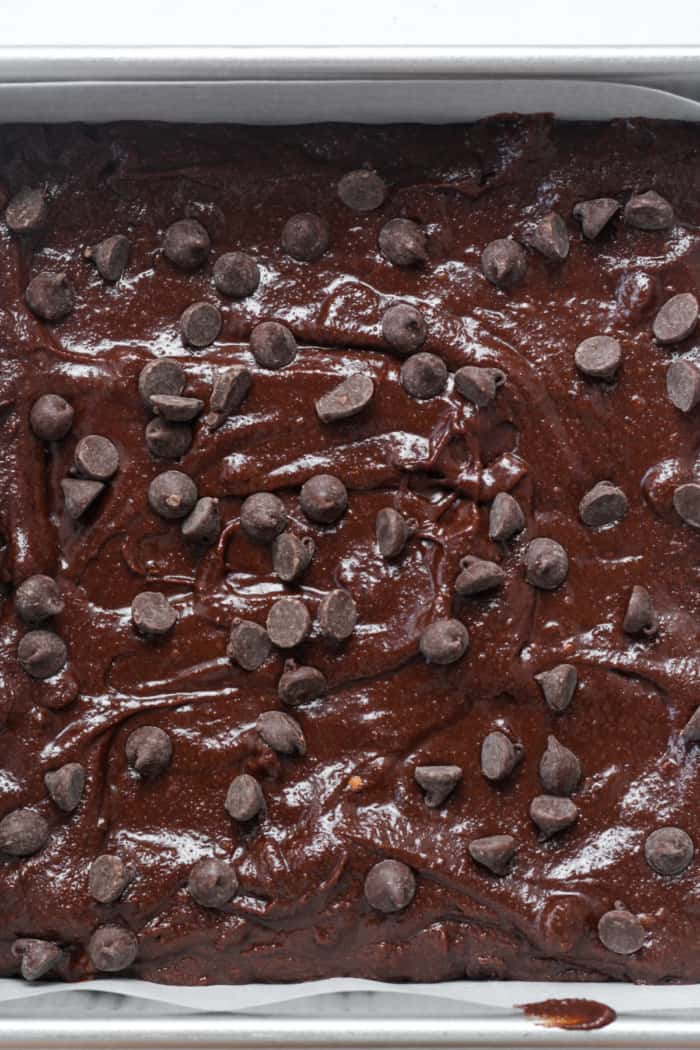 Raw brownies in pan.