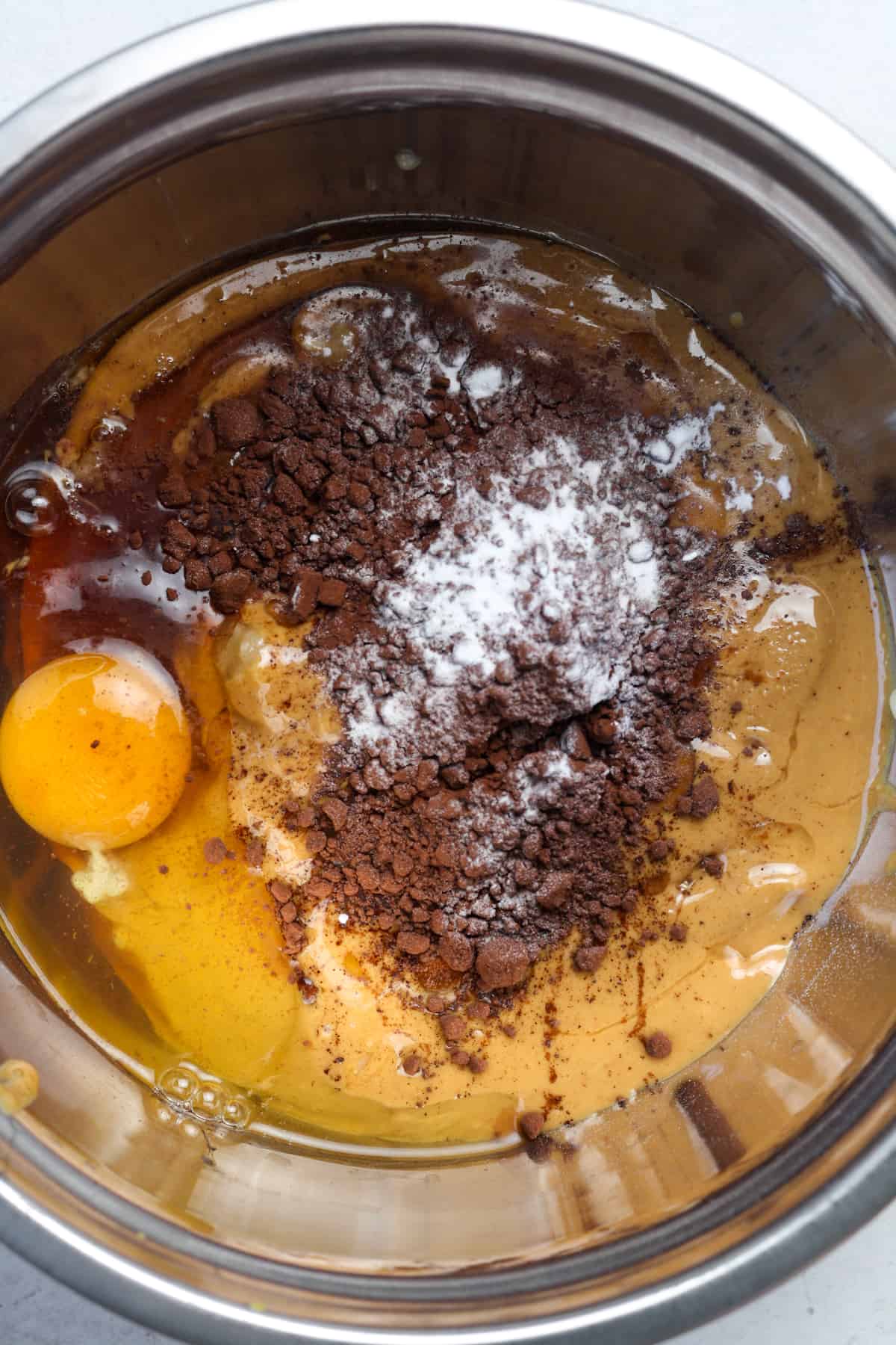 Egg, cocoa in bowl.