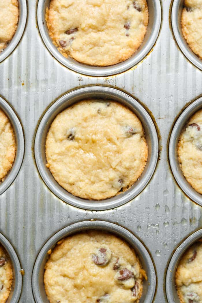 Muffin pan with dough.