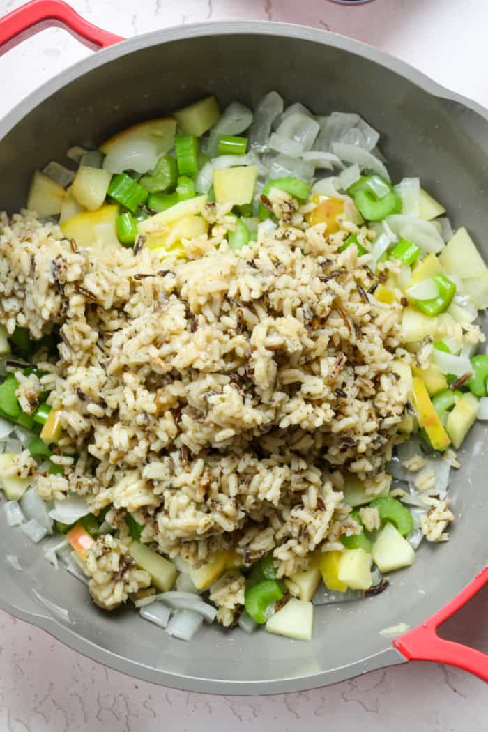 Rice and veggies in skillet.