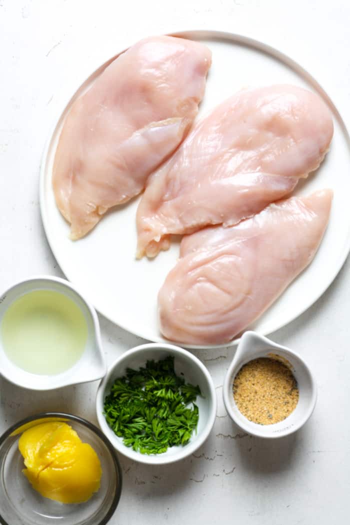 Chicken breasts and seasonings.