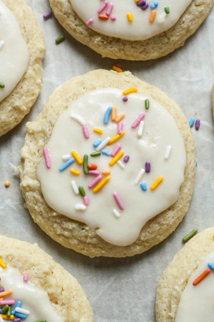 Frosted sour cream cookies with sprinkles.