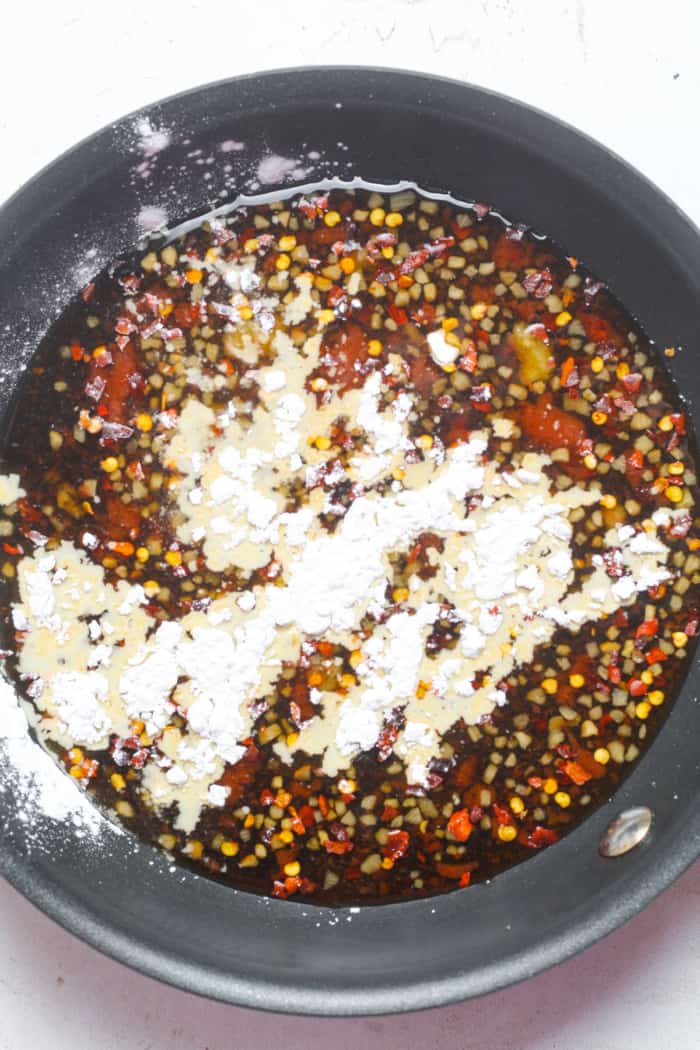 Spicy sauce in skillet.