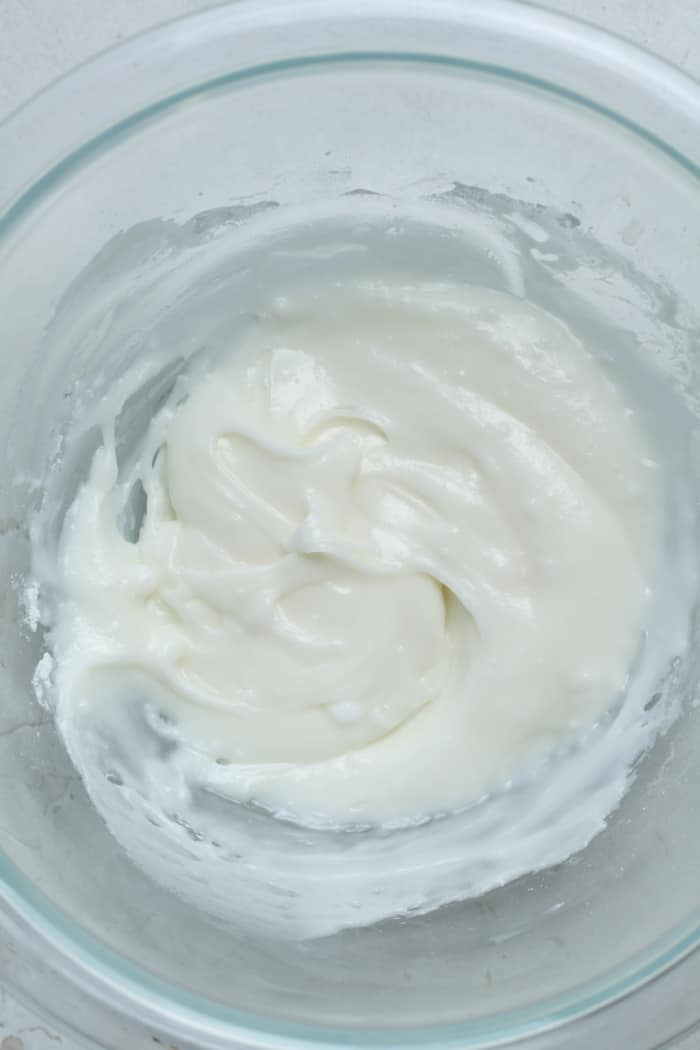 Vanilla icing in bowl.