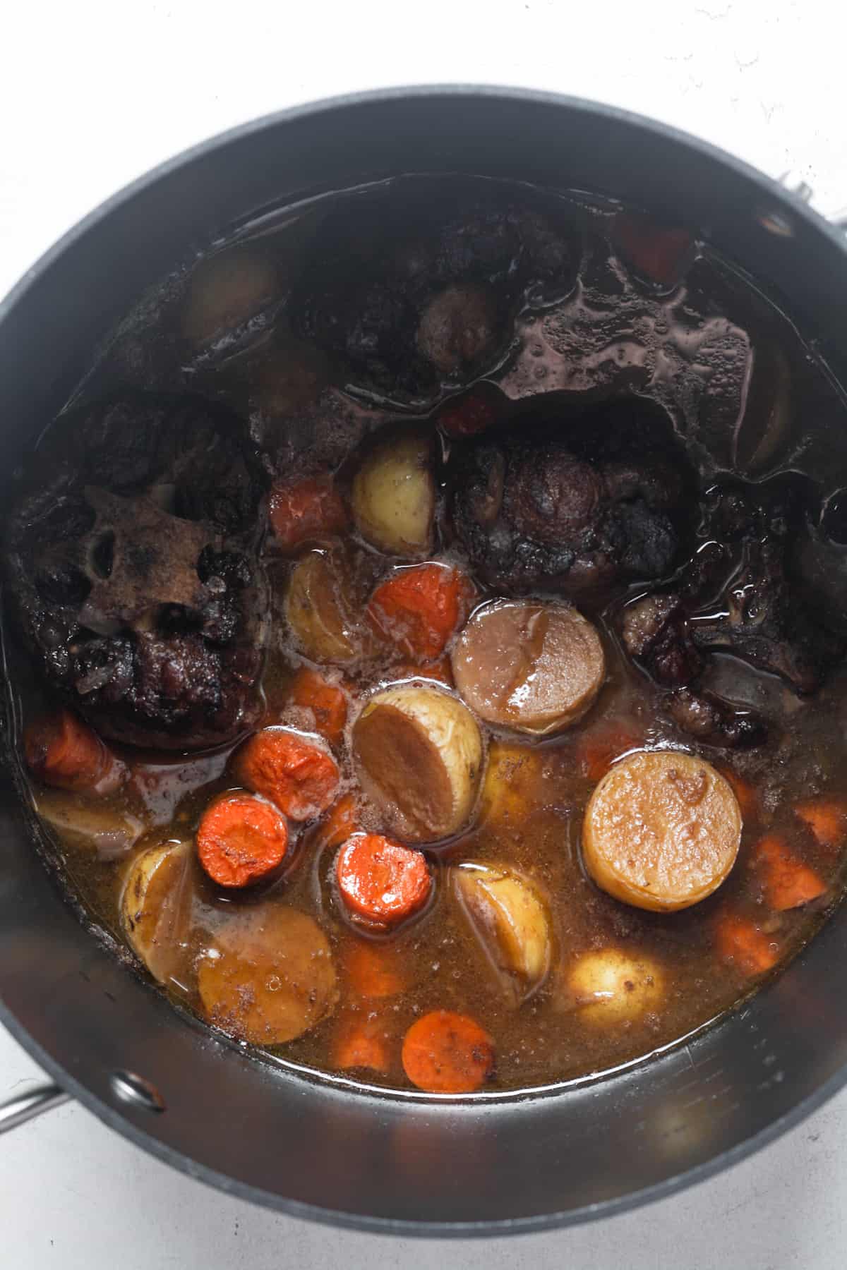 Oxtail stew in pot.