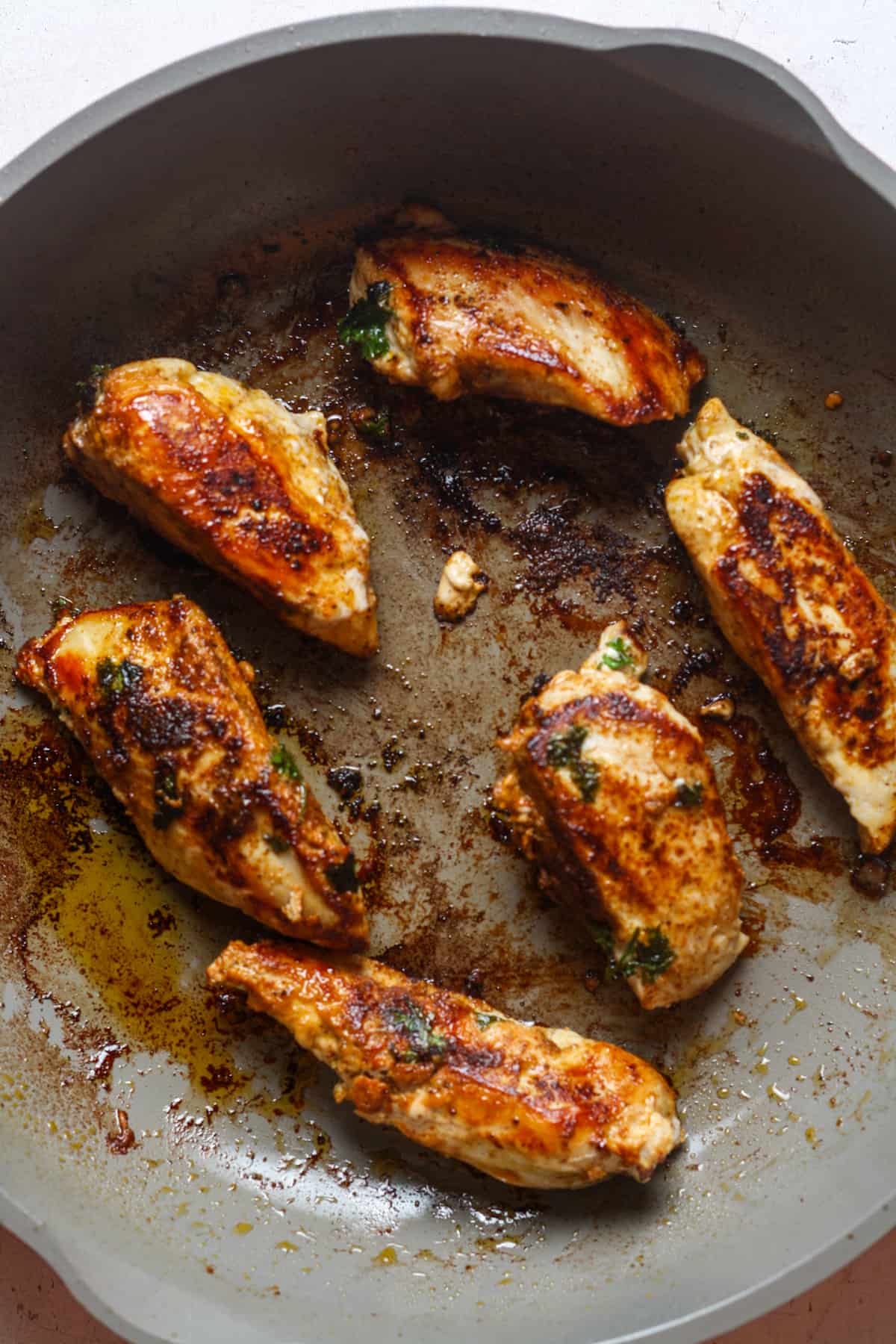 Mexican spicy chicken in pan.
