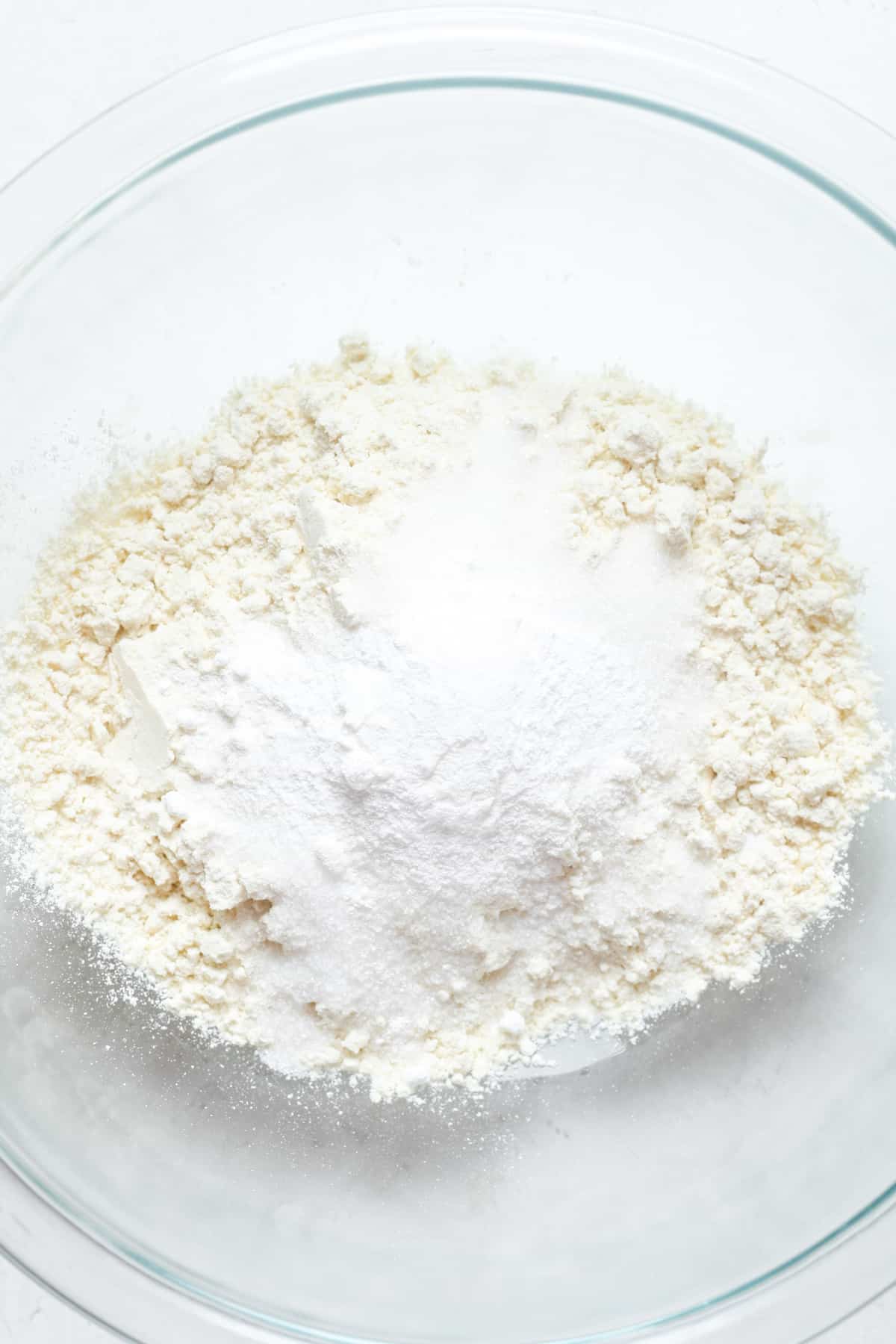 Flour and white sugar in bowl.