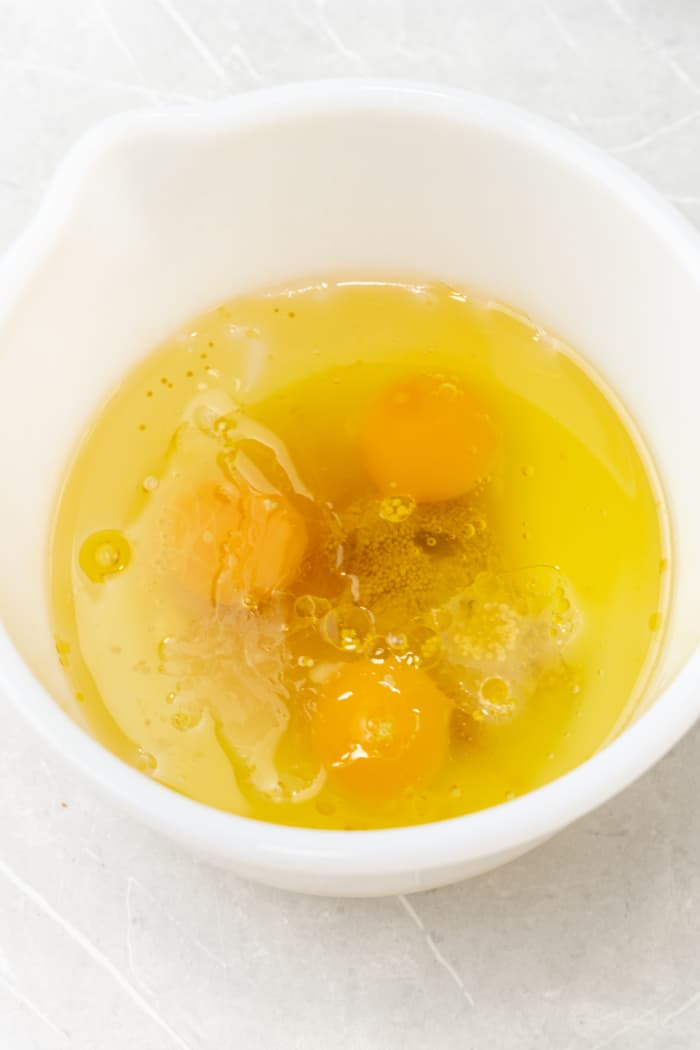Eggs and oil in bowl.
