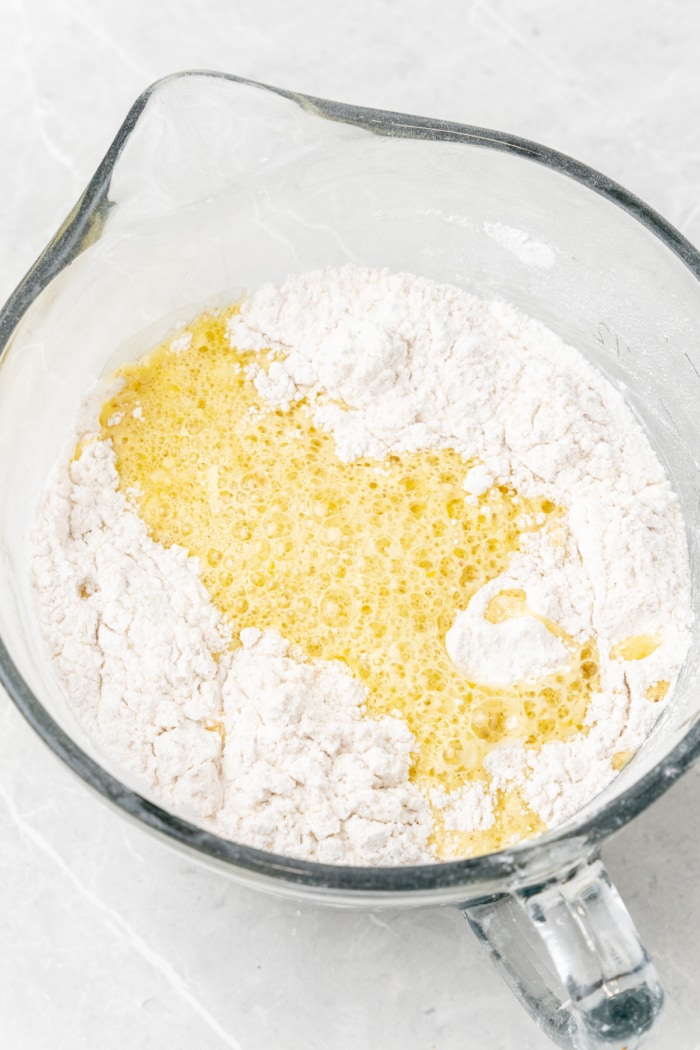 Whisked eggs with flour.