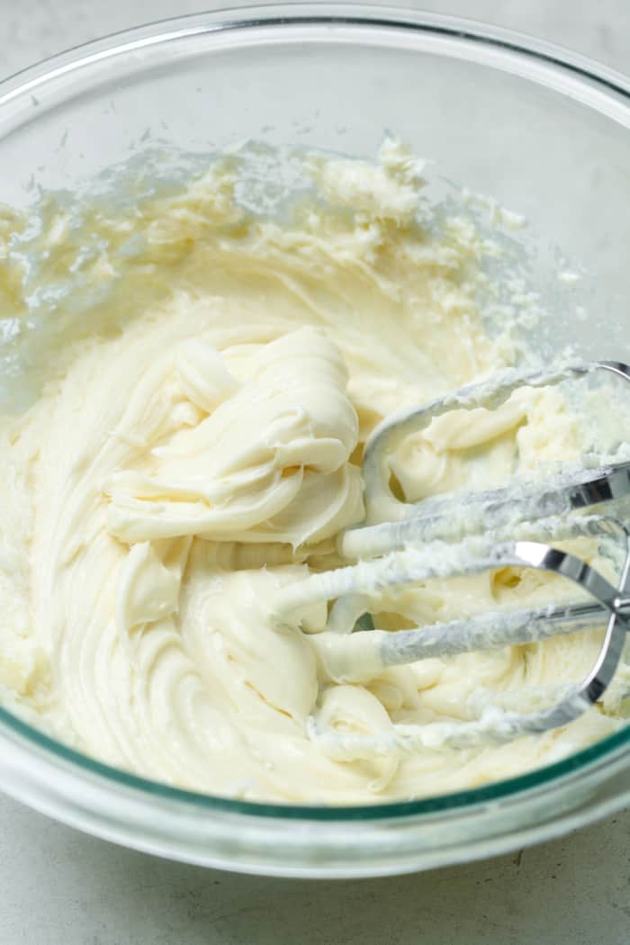 Creamy mixture with electric mixers.