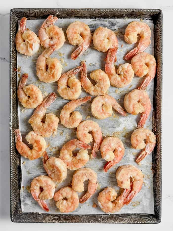 Cooked shrimp on pan.