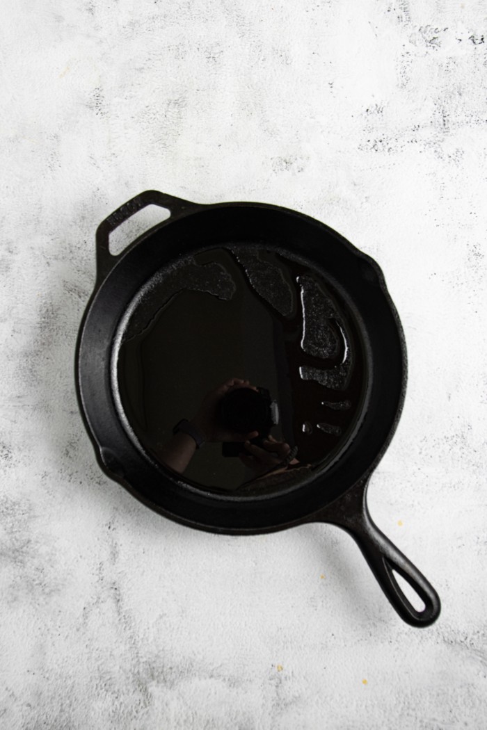 Oil in cast iron skillet.