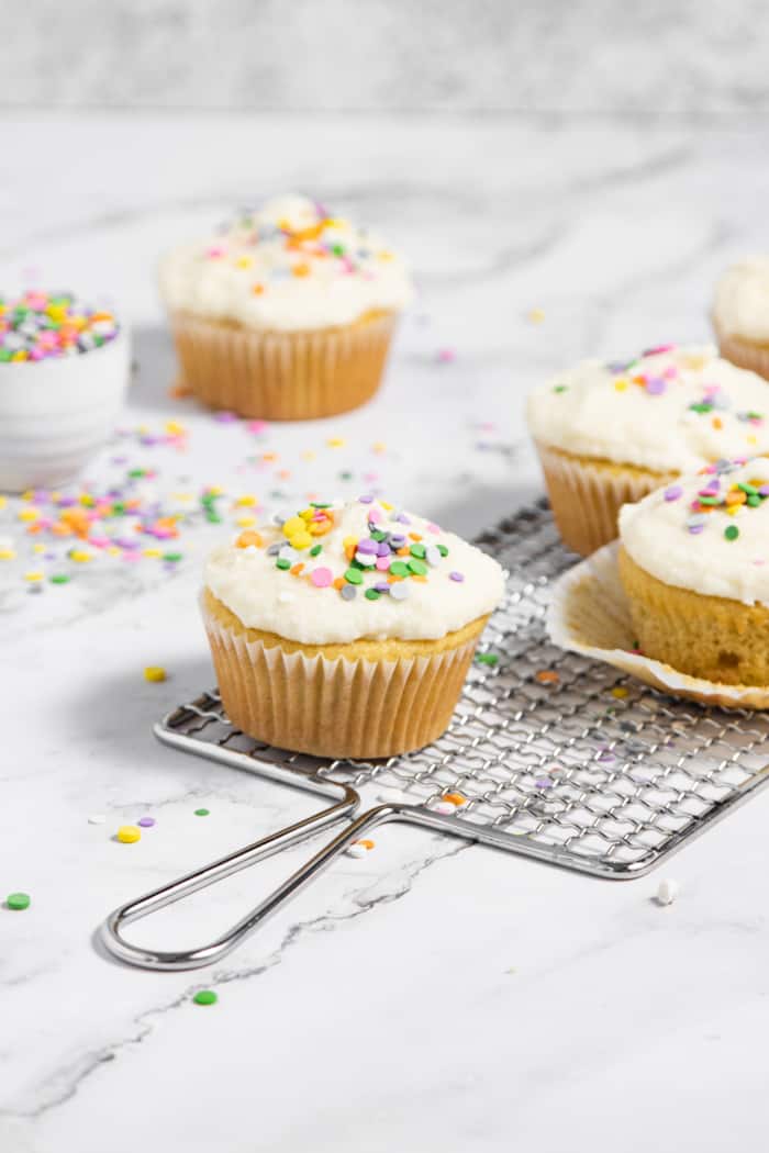 Cupcakes with vanilla frosting.