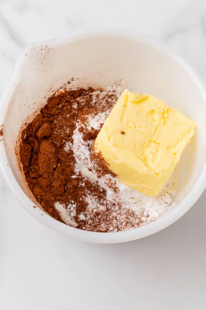 Butter and cocoa in bowl.