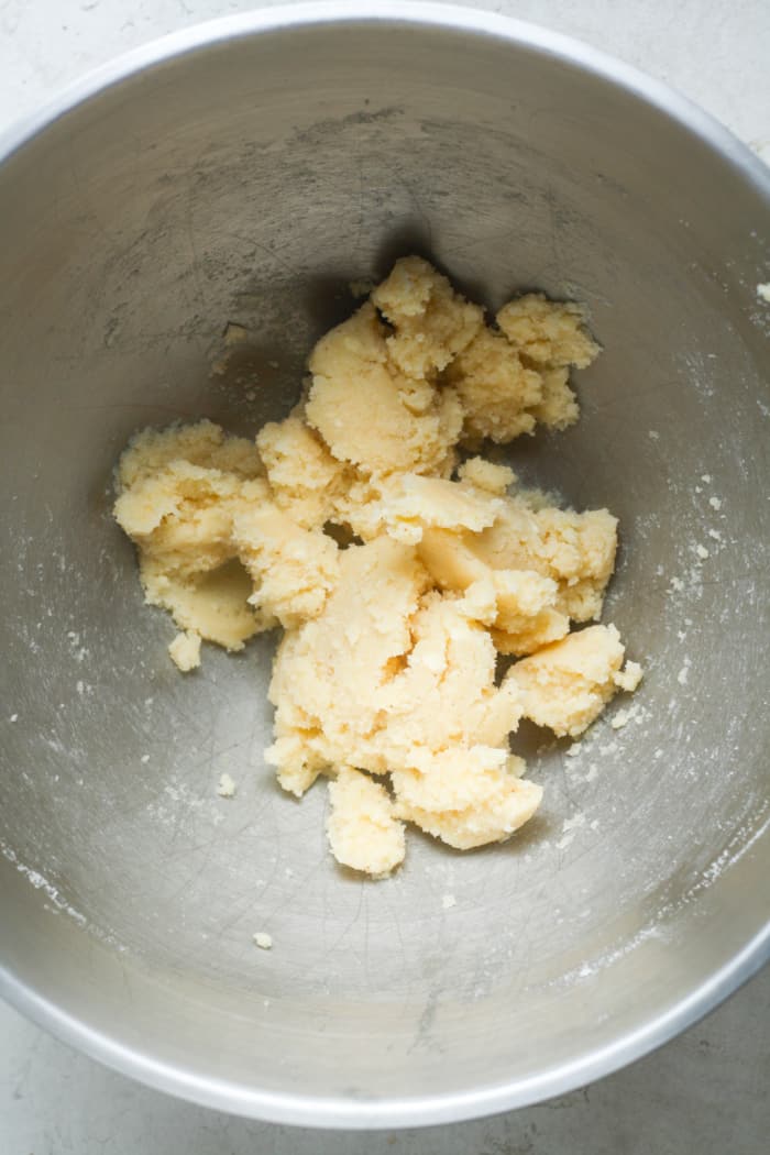 Beaten butter with sugar.