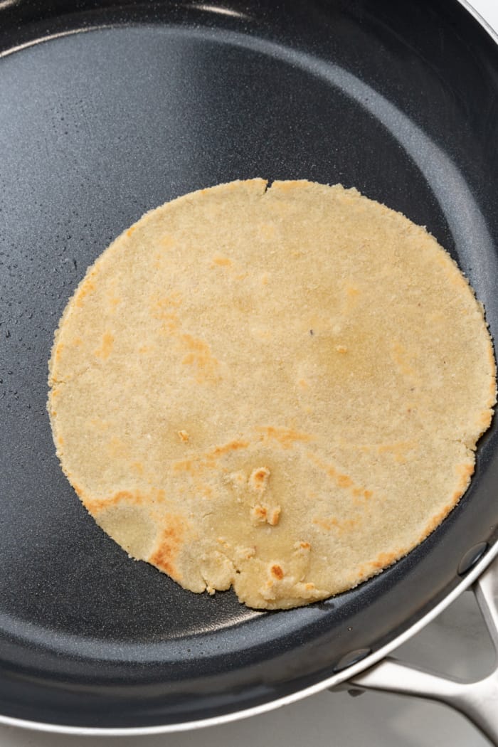 Skillet with tortilla.