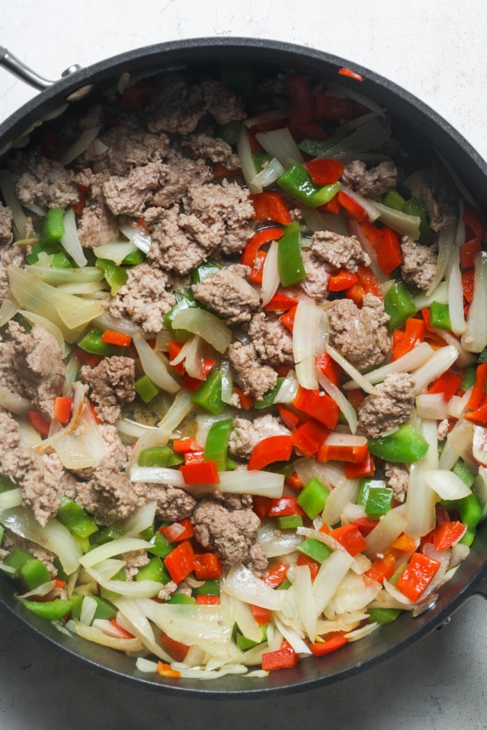 Meat with peppers and onions.