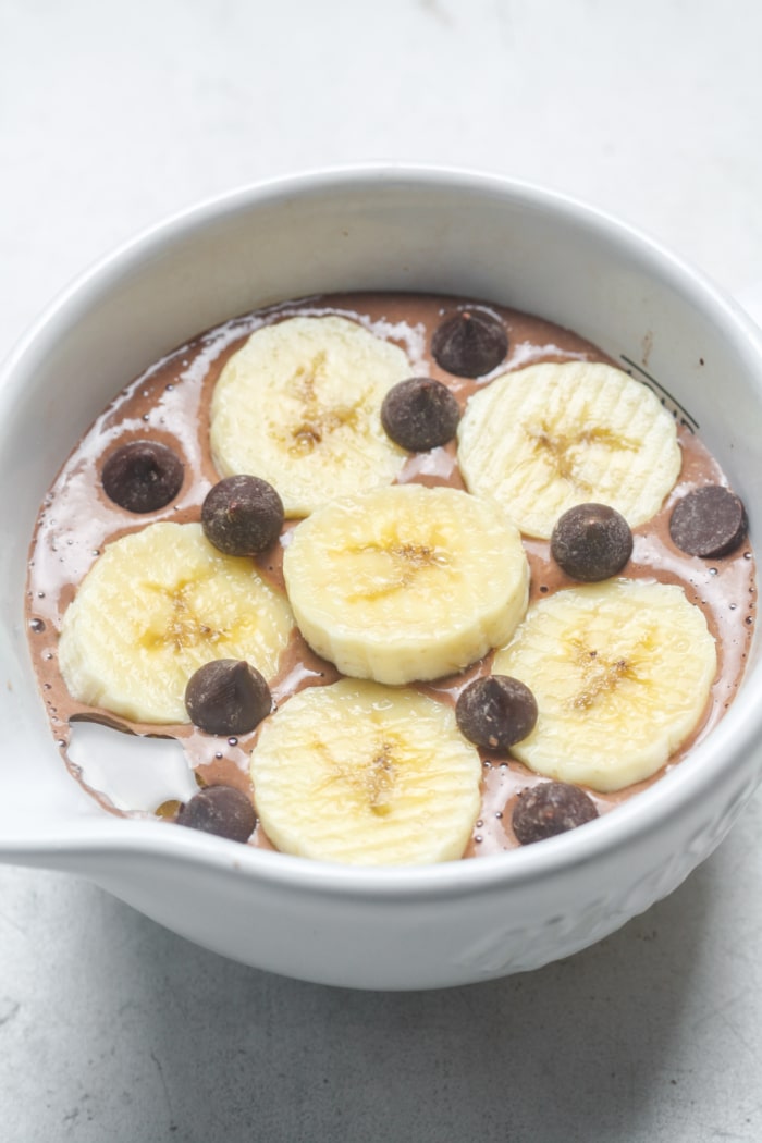 Bowl with banana and chocolate chips.