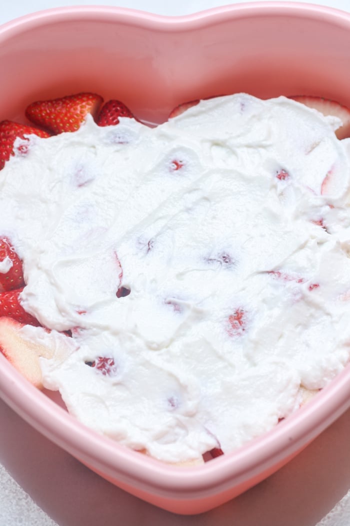Yogurt with berries in pan.