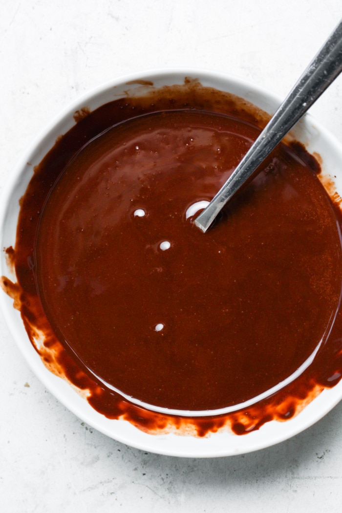Melted chocolate in bowl.